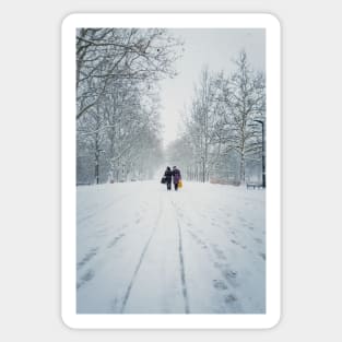 women walks the snowy street Sticker